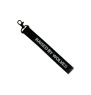 Raised By Wolves Jacquard Keychain (Schwarz)