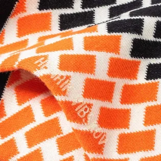Henrik Vibskov Double Bounce Socks (Orange / Schwarz)